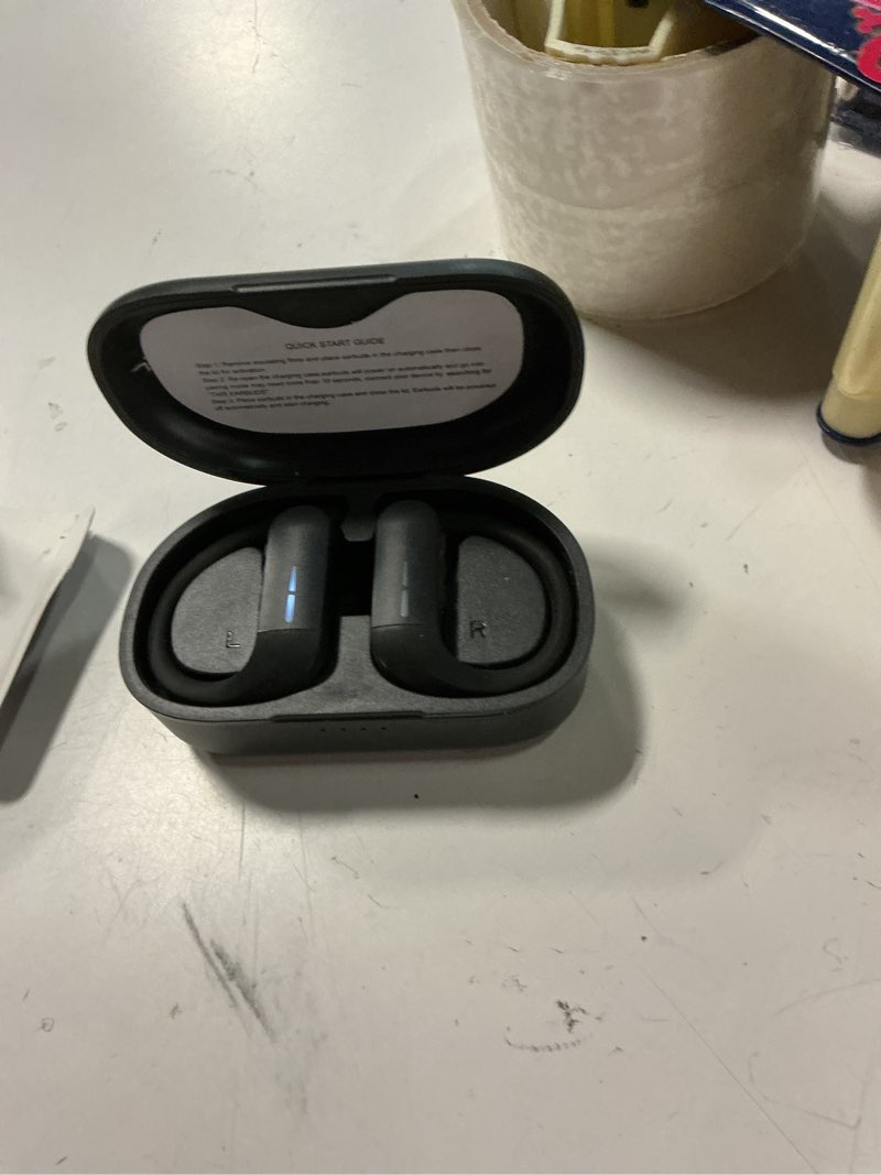 Condition photo showing Good Condition for wireless sport earphones with black charging case