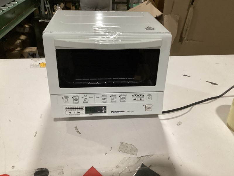 Condition photo showing As Is for Panasonic FlashXpress Toaster Oven Countertop, 4-Slice Compact Size with Double Infrared Heating, 6 Auto Cook Options and Precise Temperature Control, 1300W - NB-G110P-W (White) FlashXpress Compact White