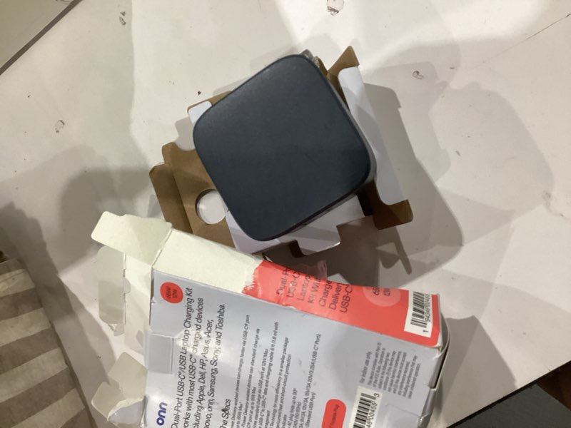 Condition photo showing As Is for onn gan 65w 12w laptop charger compatible for apple, dell, hp, asus, acer, lenovo, samsung, sony ,grey