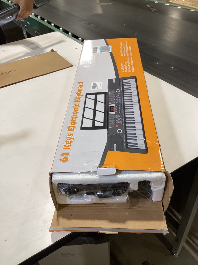 Condition photo showing New/Like New for 61 keys keyboard piano, Electronic Digital Piano with Built-In Speaker Microphone, Sheet Stand and Power Supply, Portable piano Keyboard Gift Teaching for Beginners Black