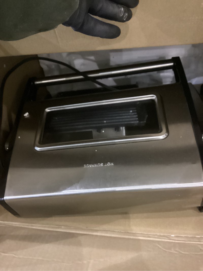 Condition photo showing As Is for Hamilton Beach Electric Indoor Searing Grill with Viewing Window  Removable Easy to Clean Nonstick Plate  6-Serving  Extra-Large Drip Tray  Stainless Steel  25361