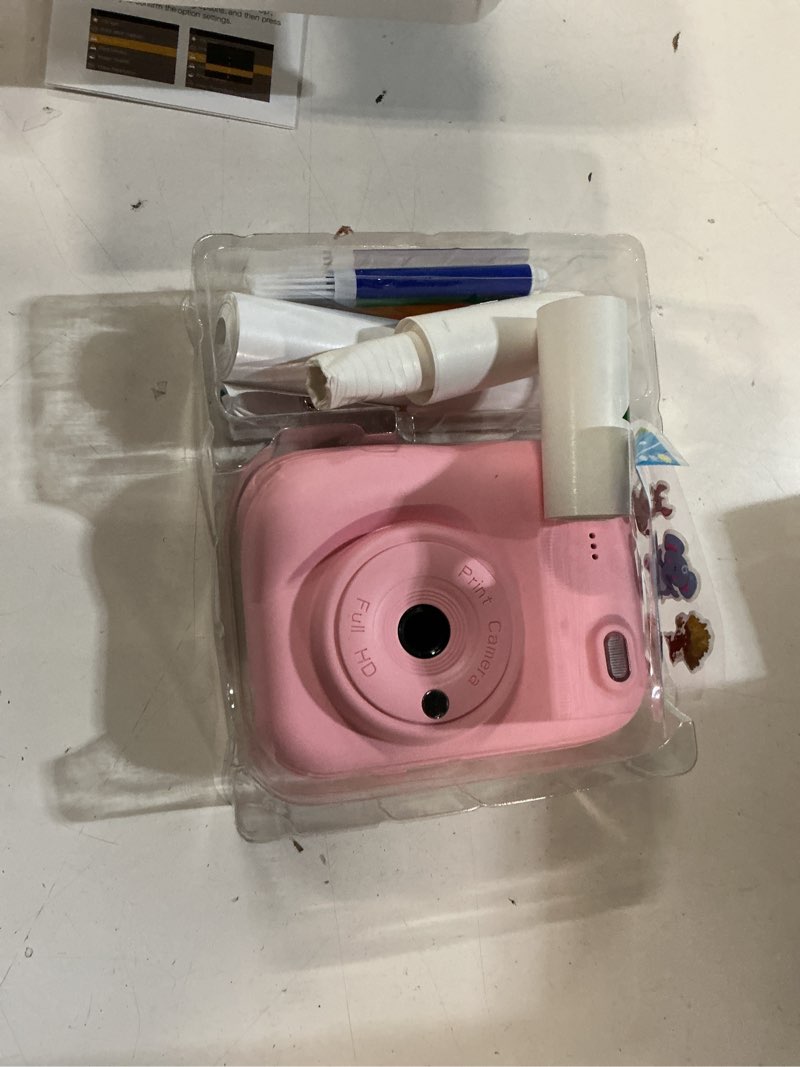 Condition photo showing Good Condition for kids camera instant print camera for kids, toddler camera toys for 3 4 5 6 7 8 year old girls christmas birthday gifts, kids digital camera instant print color photos 5 rolls paper 32gb card, pink