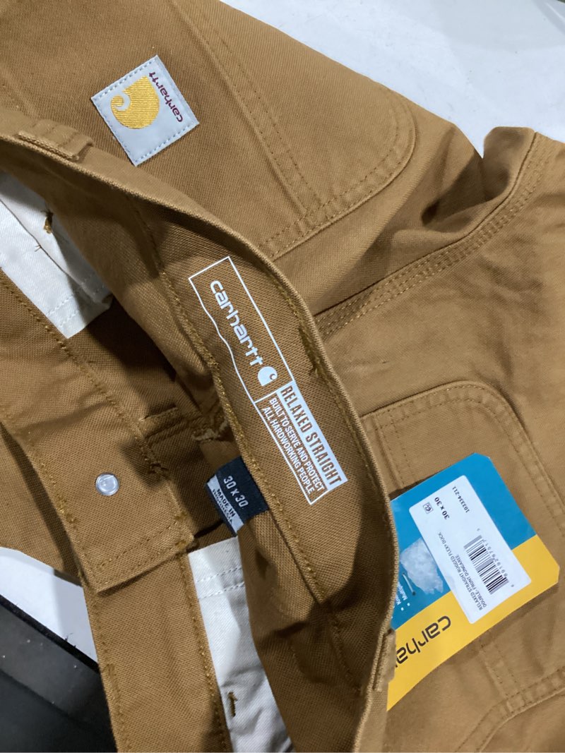 Condition photo showing Good Condition for carhartt men's relaxed fit carhartt brown canvas work pants (30 x 30)