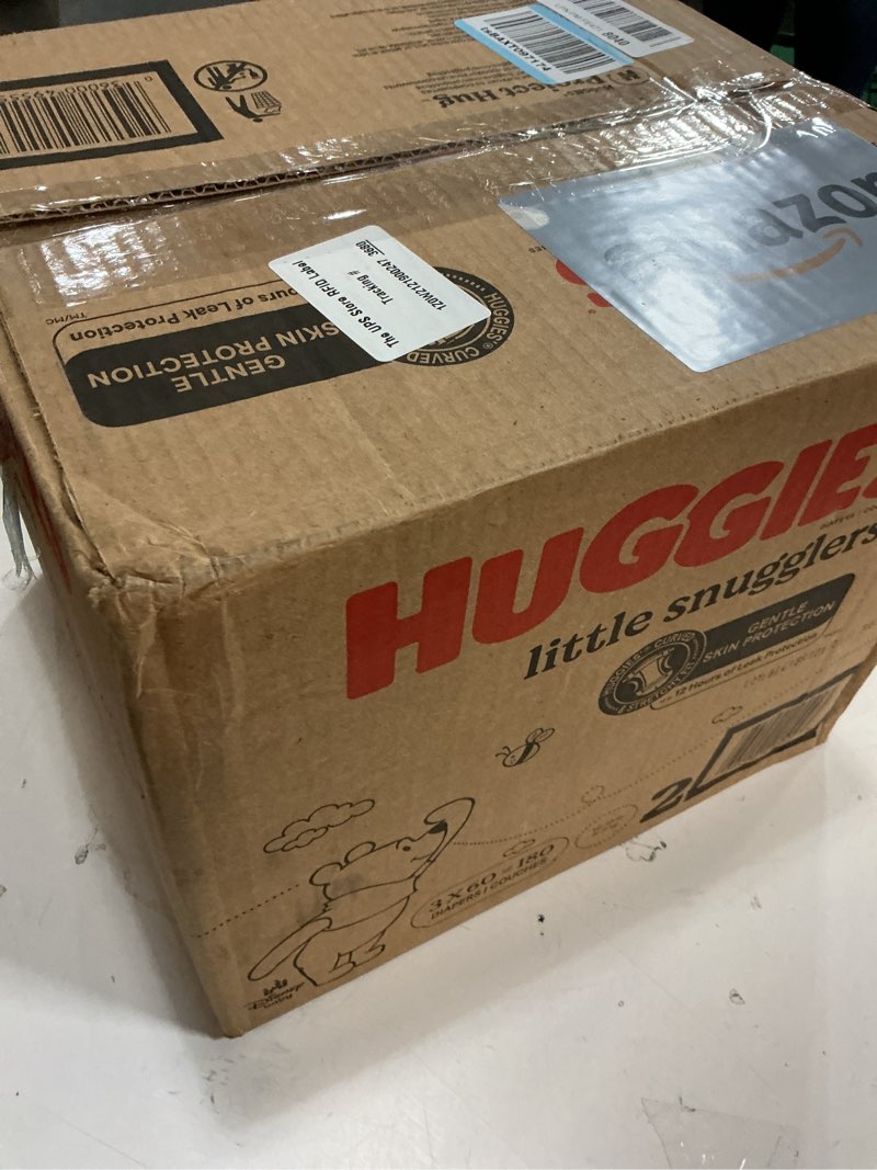 Condition photo showing New/Like New for (Size:2)Huggies Size 2 Diapers, Little Snugglers Baby Diapers, Size 2 (12-18 lbs), 180 Ct (3 Packs of 60), Packaging May Vary Size 2 180