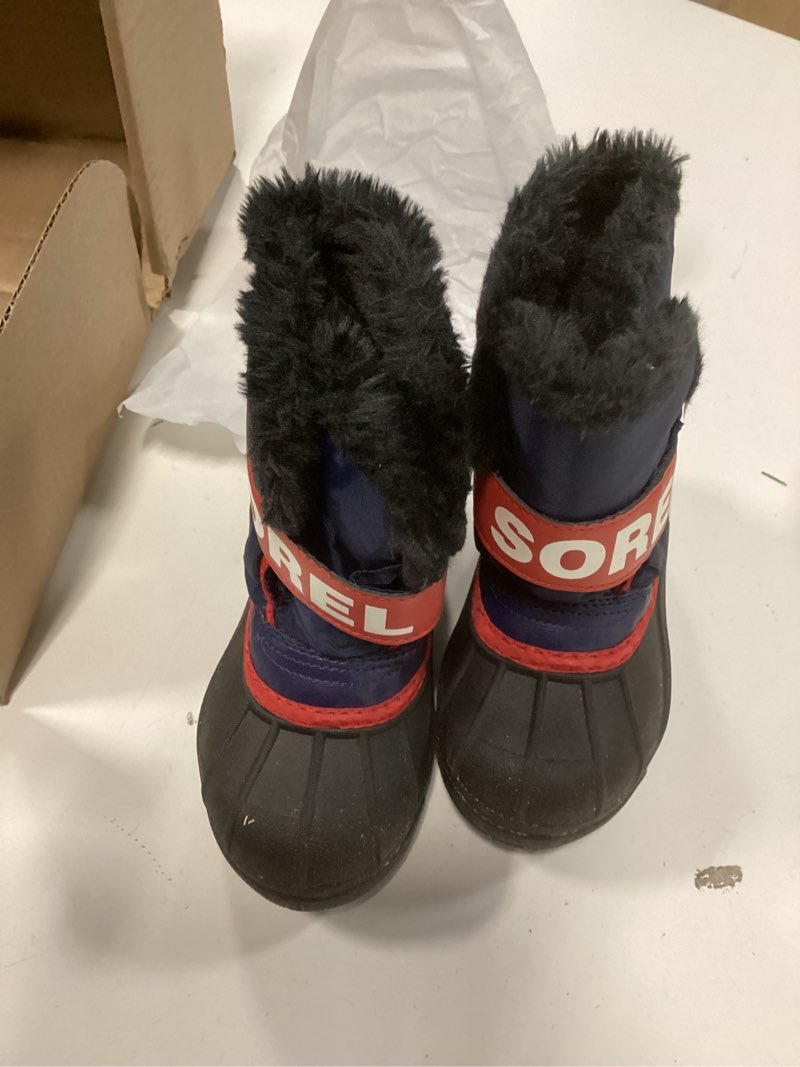 Condition photo showing As Is for SOREL Toddler's Snow Commander Boot 4 Toddler Black/Bright Red