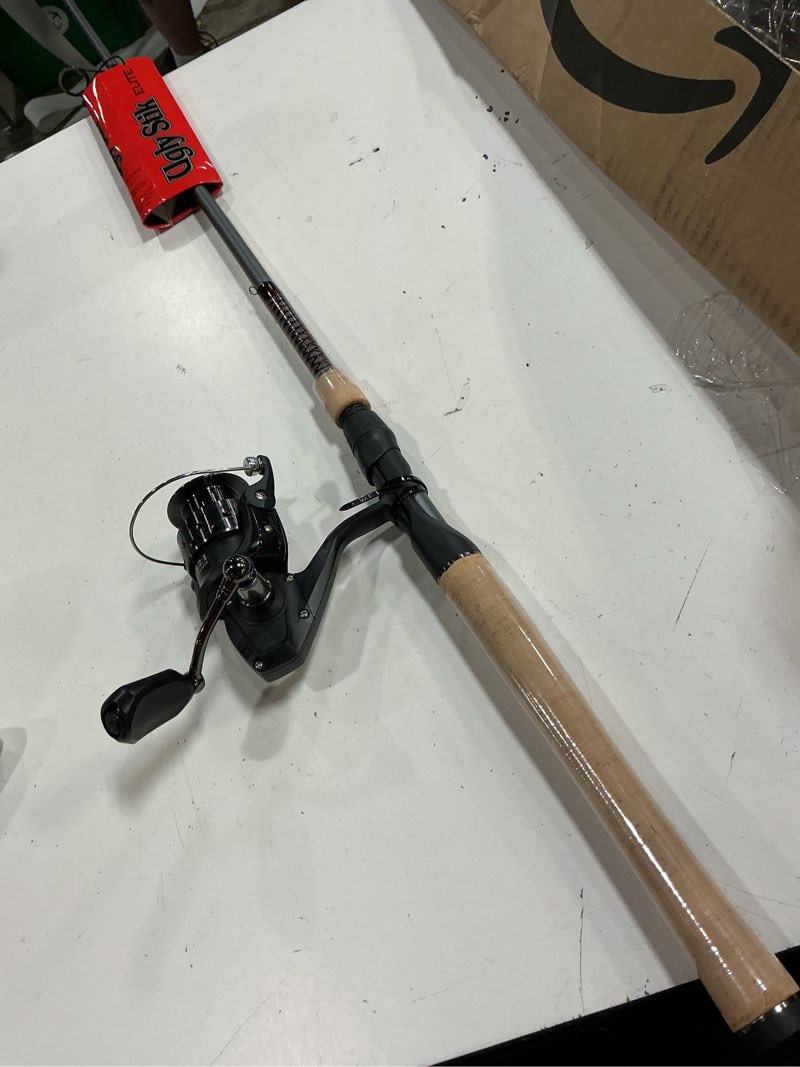 Condition photo showing As Is for ugly stik elite spinning reel and fishing rod combo new model 35 size reel - 7' - medium - 2pc - multicolor