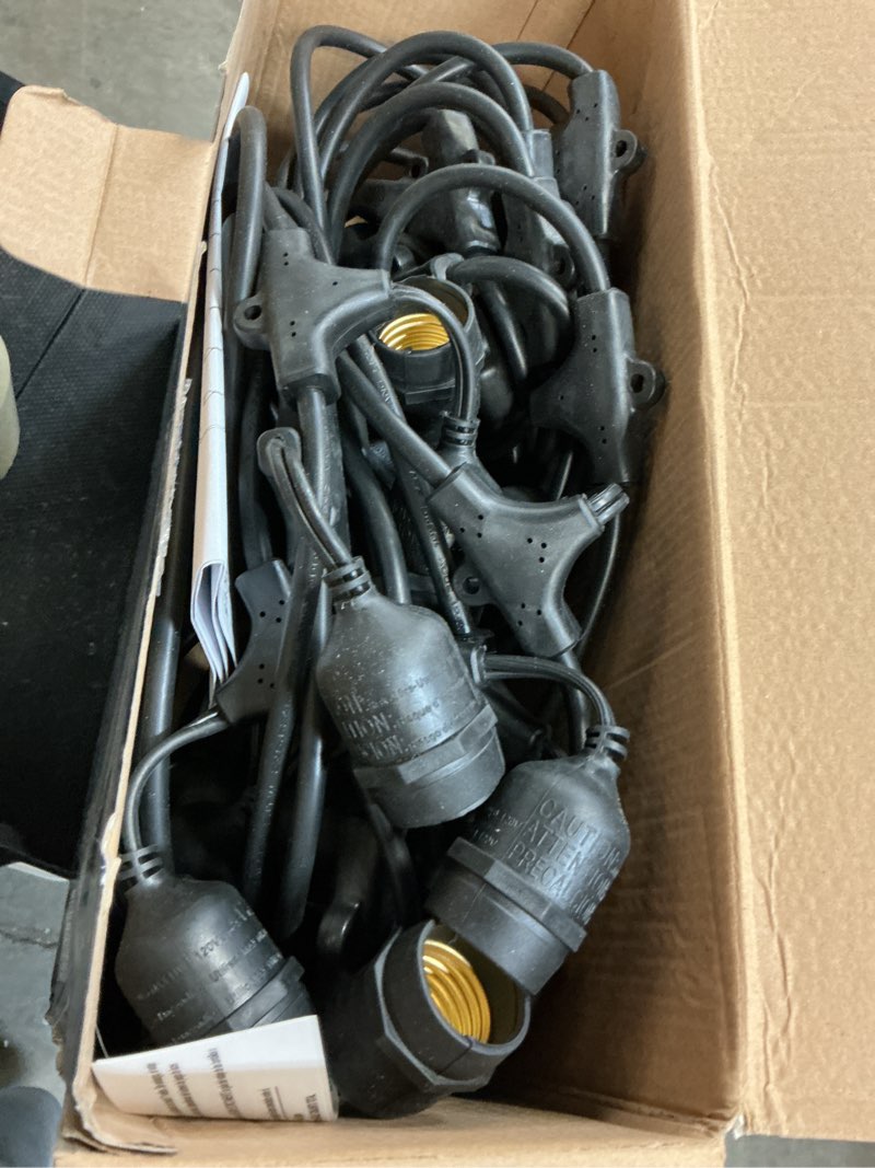 Condition photo showing As Is for harbor breeze 48-ft plug-in black indoor/outdoor string light with 24 white -light led edison bulbs