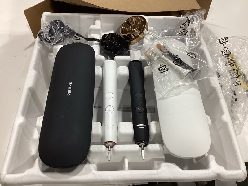 Condition photo showing Good Condition for philips sonicare diamondclean connected electric toothbrush 2 pack, x2 sonic toothbrushes, x2 charging travel cases, x2 a3 brush heads, 12 brushing settings, (black and rose gold) model hx9912/71