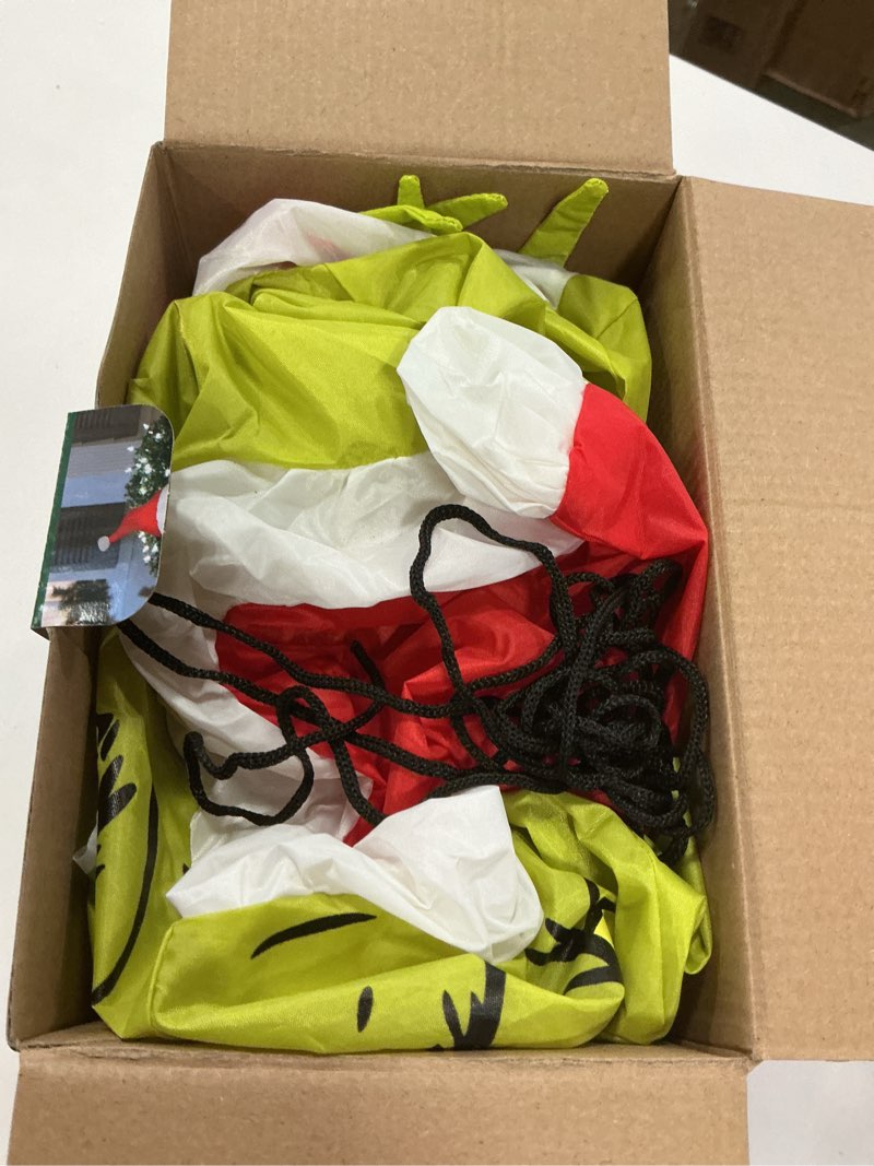 Condition photo showing As Is for Grinch Christmas Inflatable Outdoor Decoration