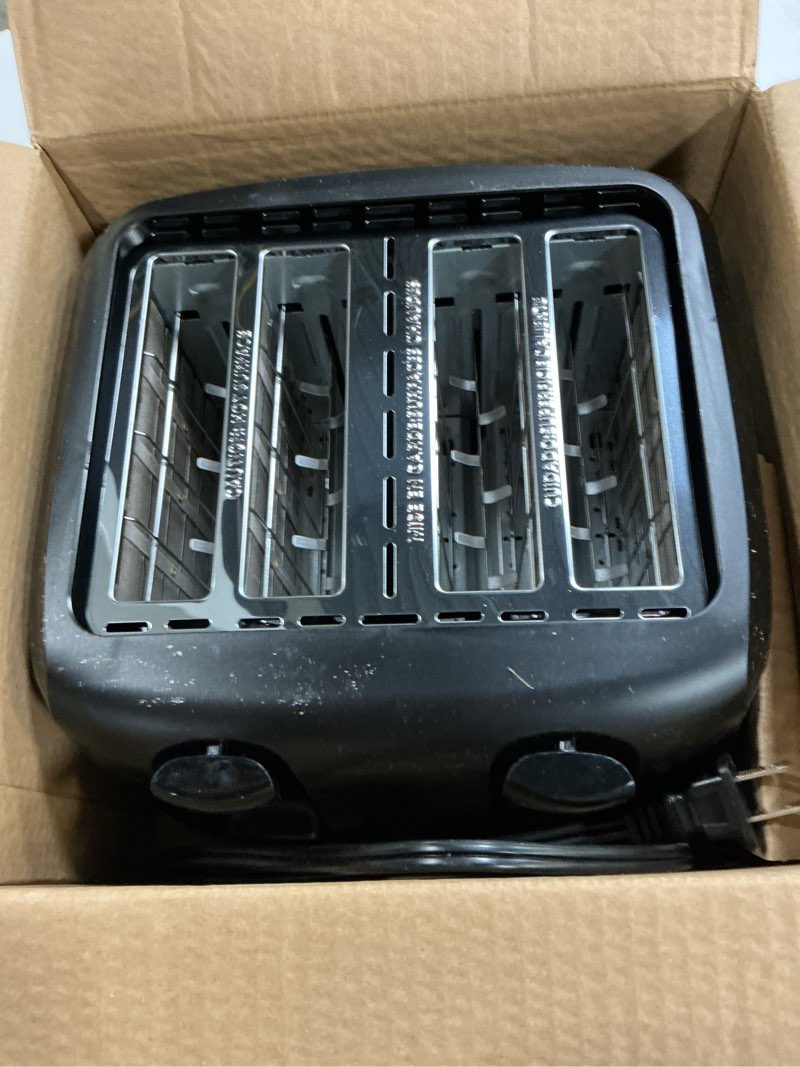 Condition photo showing As Is for mainstays 4-slice toaster black with 6 shade settings and removable crumb tray