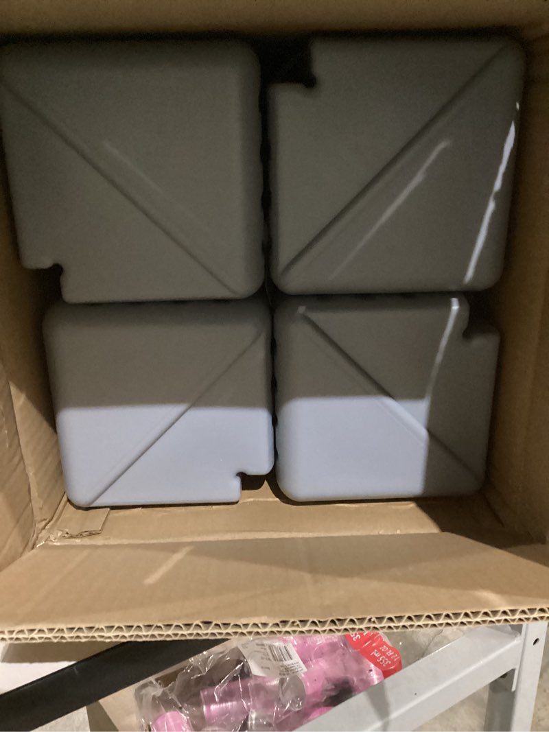 Condition photo showing As Is for Eurmax USA Universal Upgraded Water Weight Heavy Duty Feet Leg Weights Bag Canopy Weights for Gazebo Shelter,Pop up Canopies Instant Tents(4 Pcs Weights) Portable Freestanding Shelter