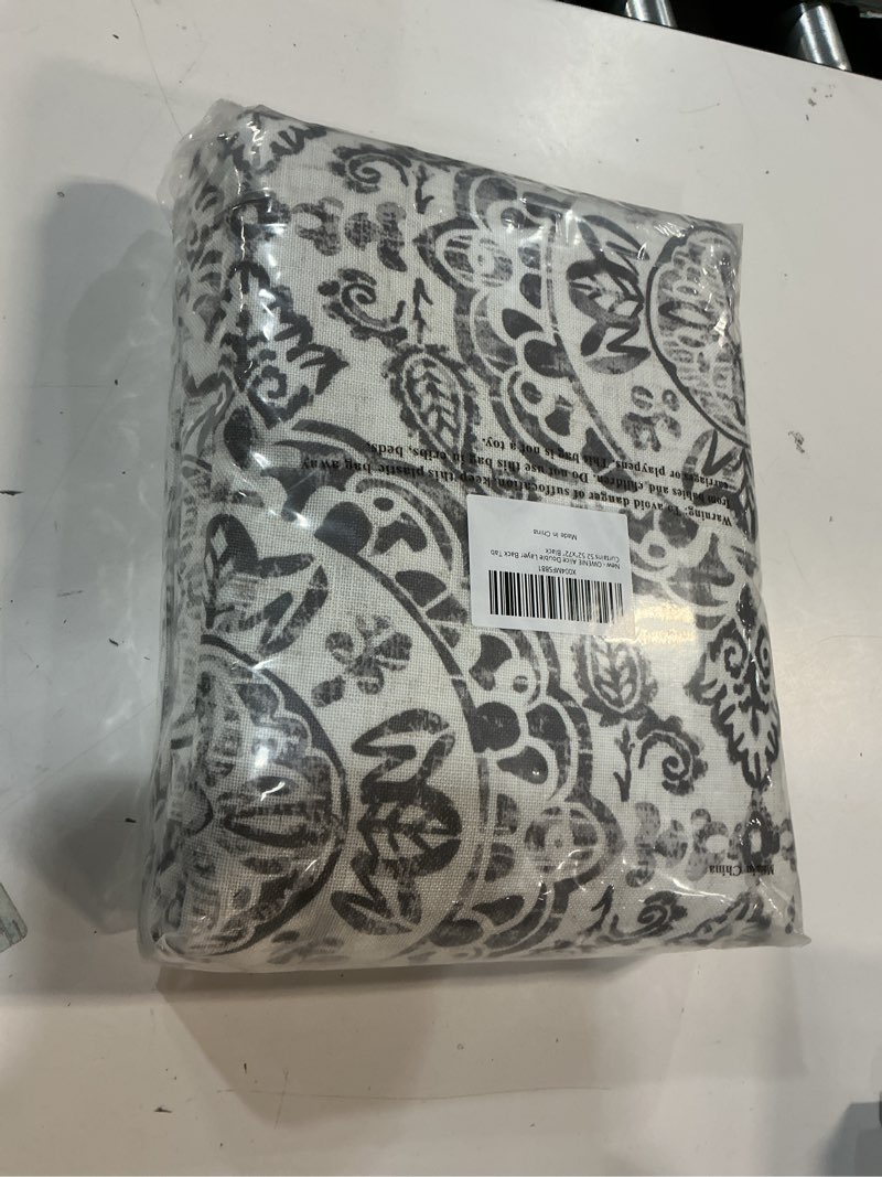 Condition photo showing New/Like New for OWENIE Extra Long Total Blackout Curtains for Bedroom 108 Inch Long 2 Panels, Black Medallion Printing Thermal Insulated 2 Layer Curtains for Living Room, Elegant Back Tab Drapes, 52Wx108L Inches Black 52"W x 108"L (Pack of 2)