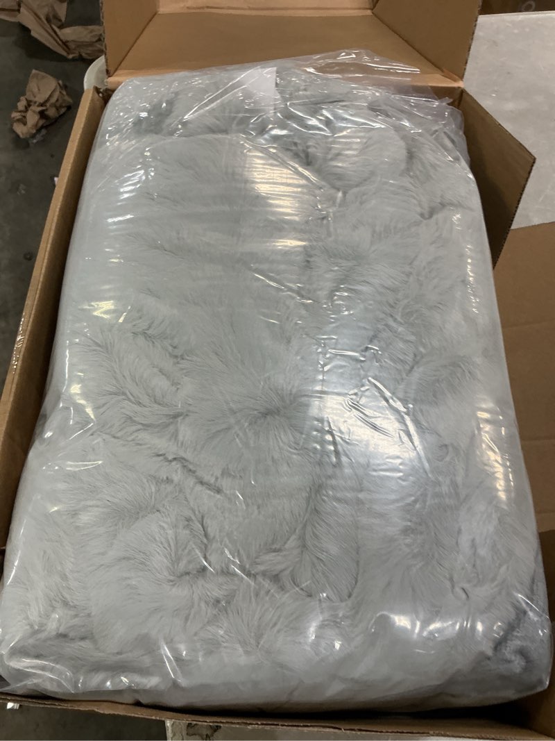Condition photo showing Good Condition for ugg plush faux fur throw blanket reversible medium weight luxury soft throw blankets for bed or chair, hypoallergenic, machine washable, home decor, 50-inch x 70-inch, seal light grey (euphoria) silver throw