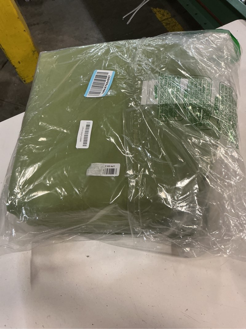 Condition photo showing Good Condition for basic beyond outdoor chair cushions set of 4, outdoor cushions for patio furniture, water resistant patio chair cushions with 2 ties, 17x16x2, grass green 01 - grass green 17"x16"x2"(pack of 4)