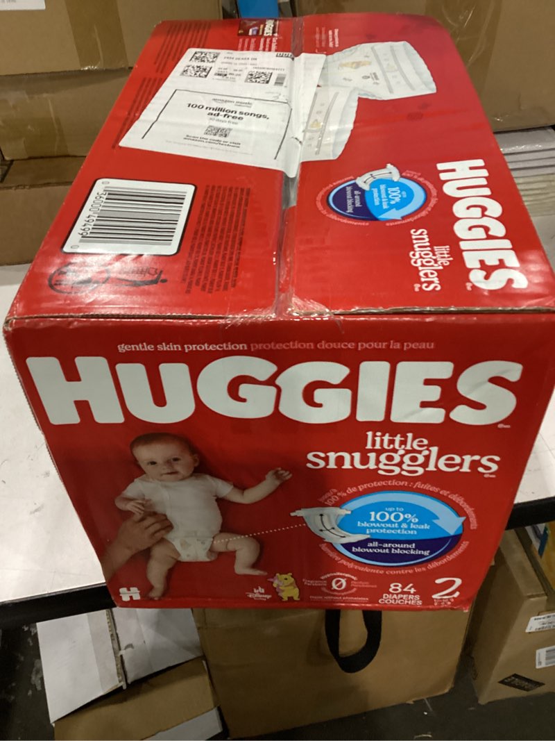 Condition photo showing New/Like New for huggies size 2 diapers, little snugglers baby diapers, size 2 (12-18 lbs), 84 count, packaging may vary