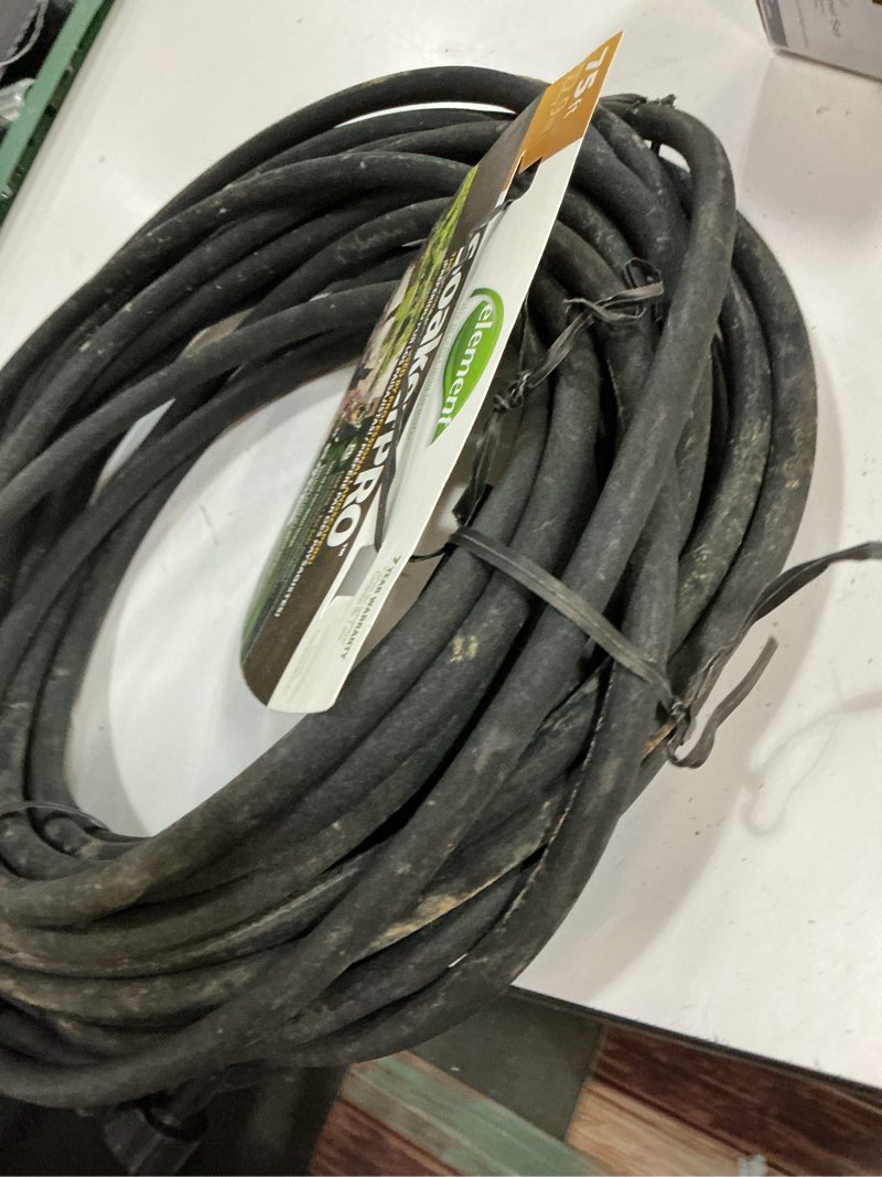 Condition photo showing As Is for element soaker 3/8" x 75' garden hose
