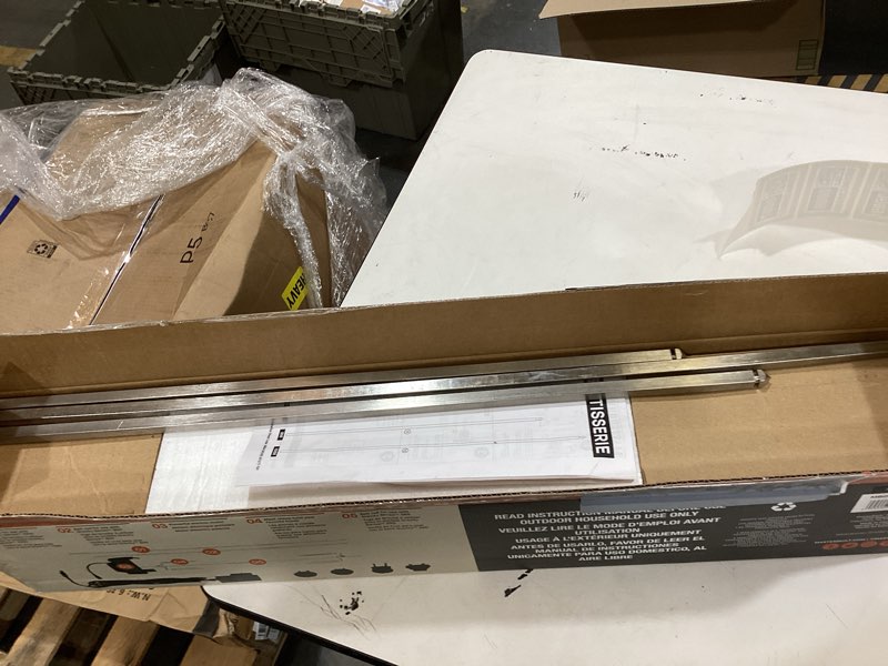 Condition photo showing Good Condition for masterbuilt® gravity series rotisserie accessory attachment with stainless steel spit rods, meat claws and and electric power source, model mb20091220 rotisserie kit