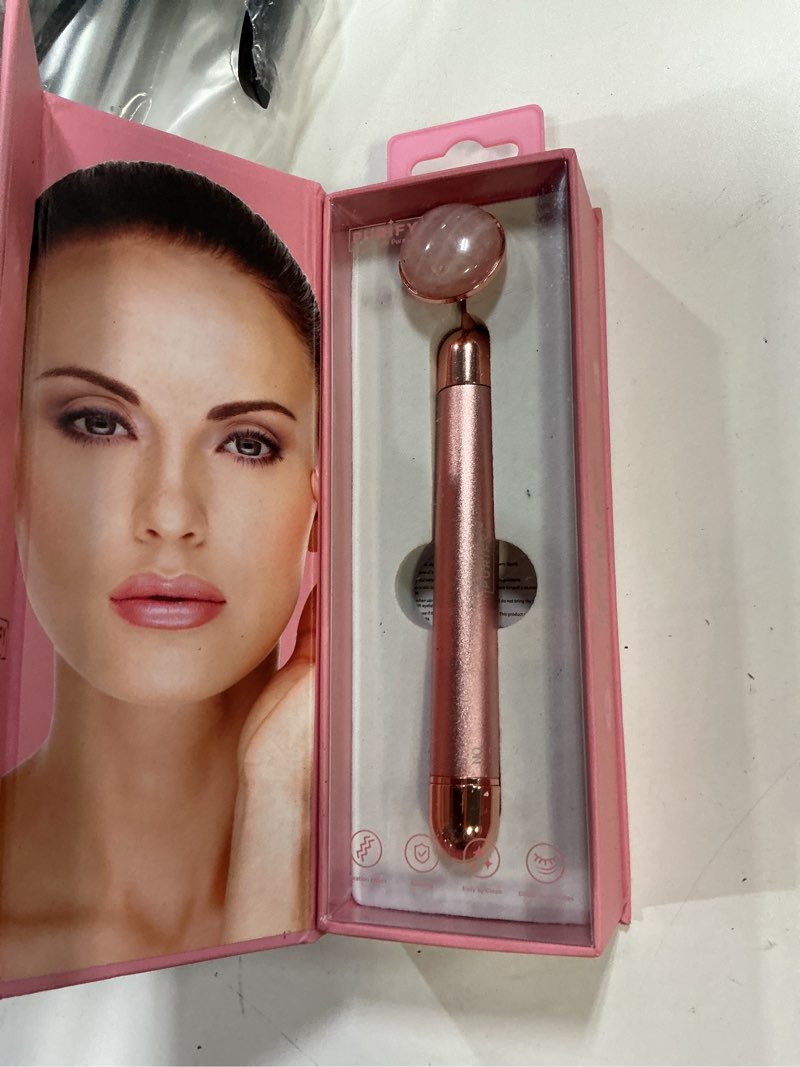 Condition photo showing Good Condition for Purify Rose Quartz Vibrating Facial Roller in Pink