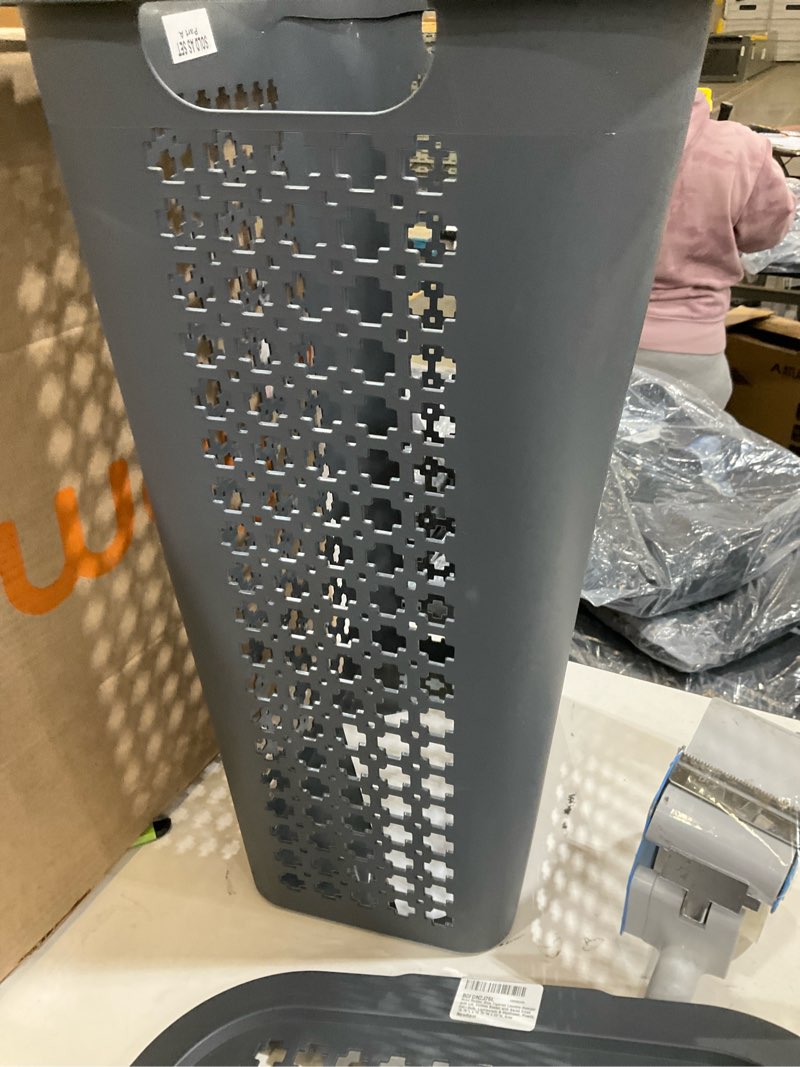 Condition photo showing As Is for Mind Reader Slim Tapered Laundry Hamper with Lid, Clothes Basket with Swiss Cross Cut-Outs, Lightweight & Ventilated, Plastic, 16.75"L x 12.75"W x 23"H, Gray