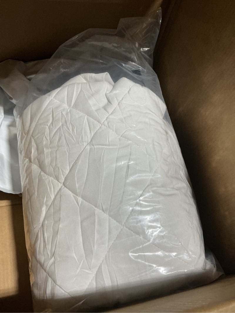 Condition photo showing As Is for SERTA Power Clean Triple Action Quilted Soft Waterproof Mattress Pad Protector, Moisture Wicking Protection with 15" Deep Pocket, Twin XL, White White Twin XL