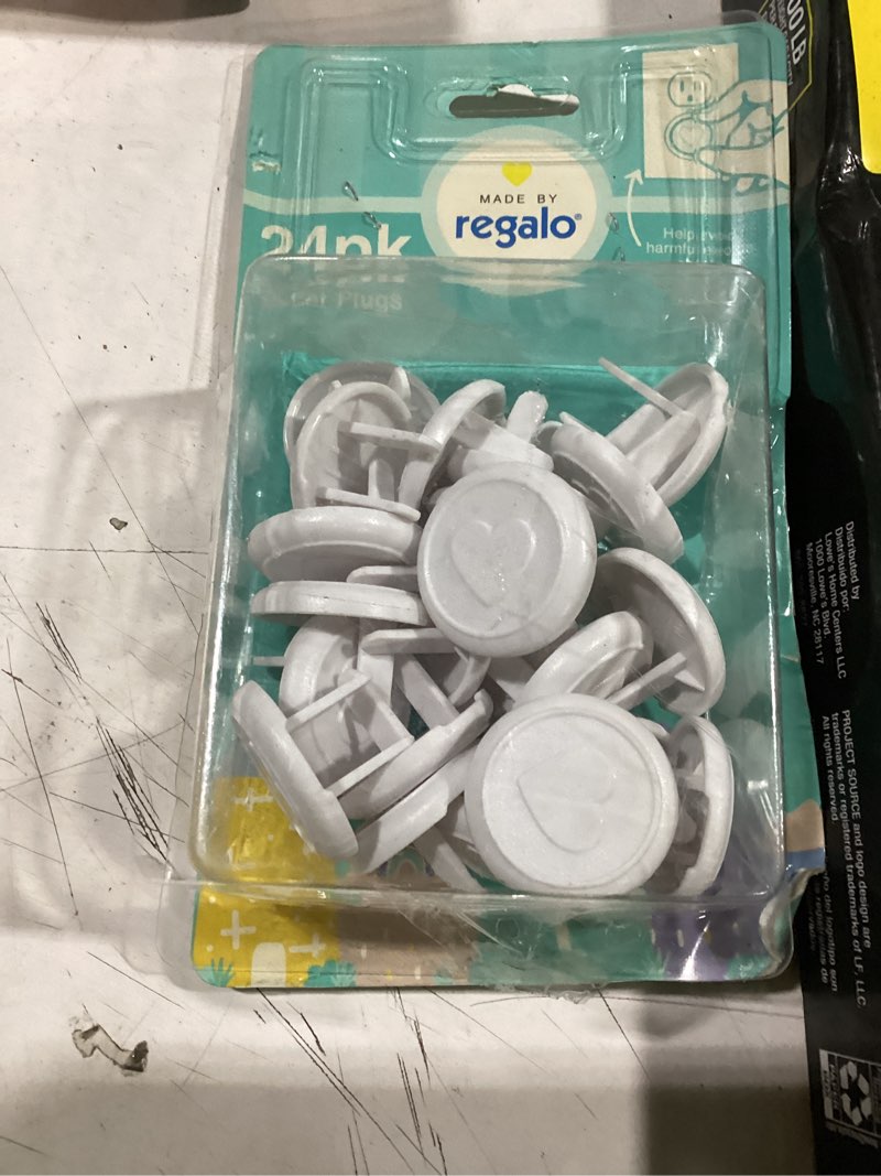 Condition photo showing As Is for regalo home safety white outlet plugs 24 -pack
