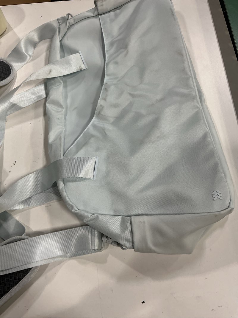 Condition photo showing As Is for sporty 20" duffel bag - all in motion - ice blue