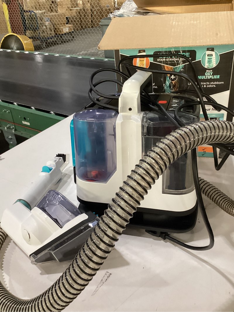Condition photo showing As Is for USED NOT TESTED Shark StainStriker Portable Carpet, Upholstery & Area Rug Cleaner with Pet Mess Tool, Stain & Odor Remover, Perfect for Car Interiors, Includes 3 Cleaning Tools & Cleaning Solution, White, PX201