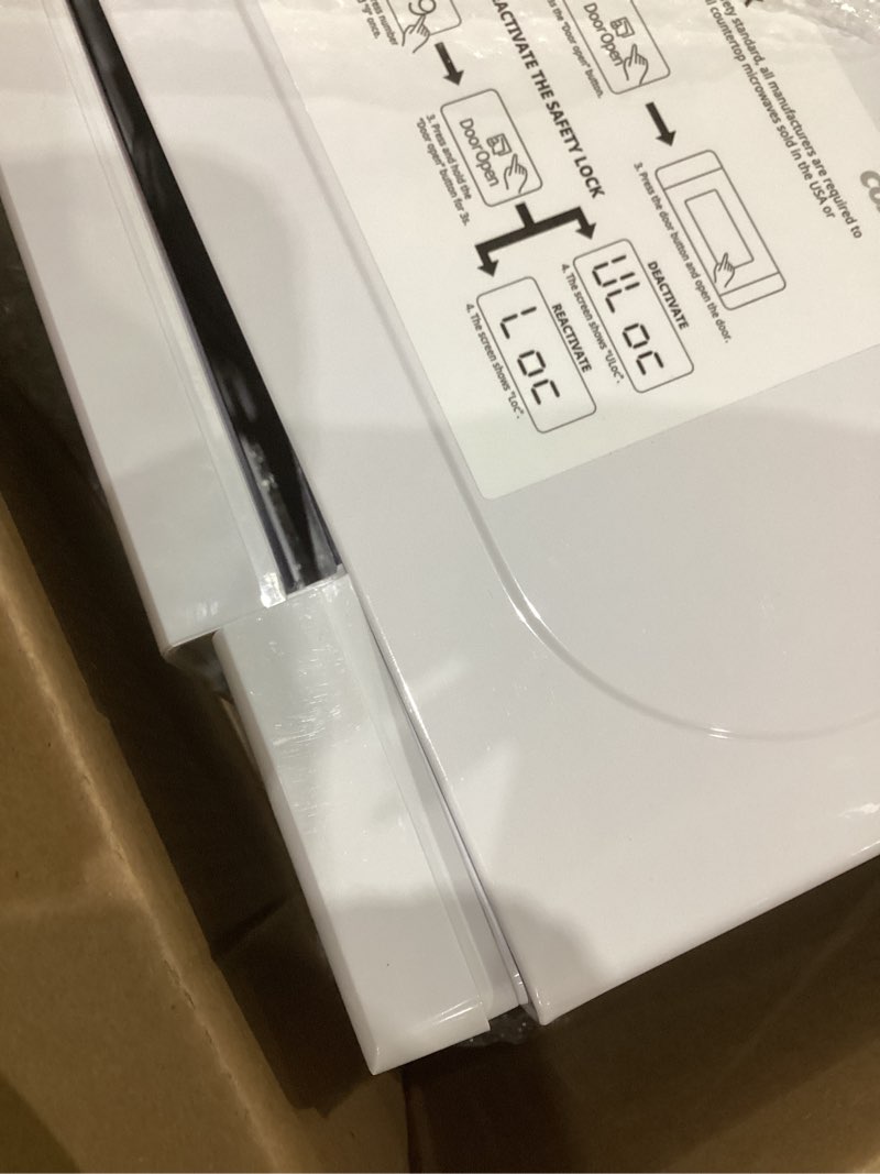 Condition photo showing As Is for COMFEE CMO-C20M1WH Retro Microwave with 11 power levels, Fast Multi-stage Cooking, Turntable Reset Function Kitchen Timer, Speedy Cooking? Weight/Time Defrost, Memory function, Children Lock, 700W Modern White