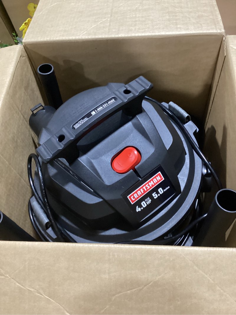 Condition photo showing As Is for craftsman 5-gallon 4-hp corded wet/dry shop vacuum with accessories included