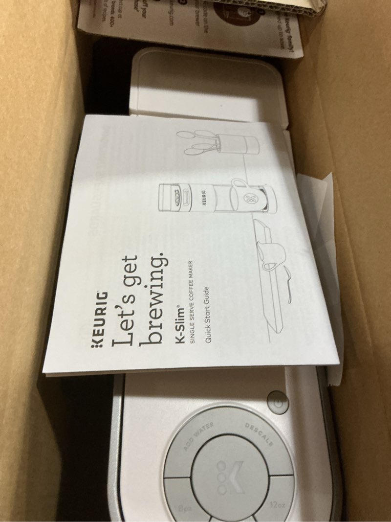 Condition photo showing As Is for keurig k-slim single serve k-cup pod coffee maker, multistream technology, 3 brew sizes, slim and sleek design, 46oz removable reservoir, white