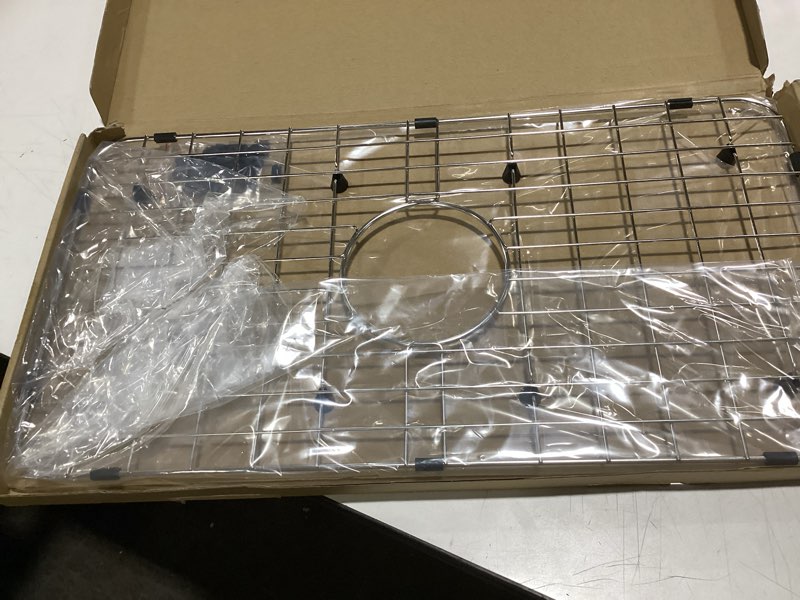 Condition photo showing Good Condition for Serene Valley Sink Bottom Grid 24-1/8" x 12-5/8", Centered Drain with Corner Radius 1-1/2", Sink Protector NLW2412C