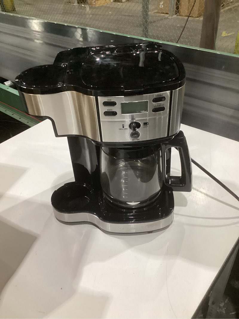 Condition photo showing As Is for (used, not tested, incomplete parts)hamilton beach 2-way 12 cup programmable drip coffee maker & single serve machine, glass carafe, auto pause and pour, black (49980r)