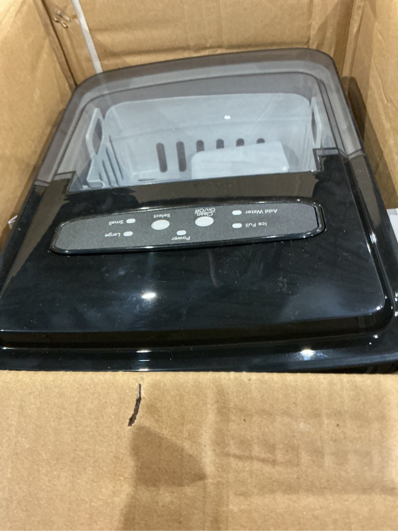 Condition photo showing As Is for frigidaire countertop portable, 26 lb per day bullet ice maker machine (black stainless steel)