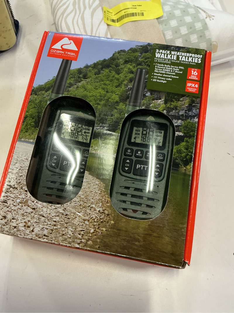 Condition photo showing New/Like New for ozark trail two way walkie talkie, ipx4, 22 channel, green, 2 pack