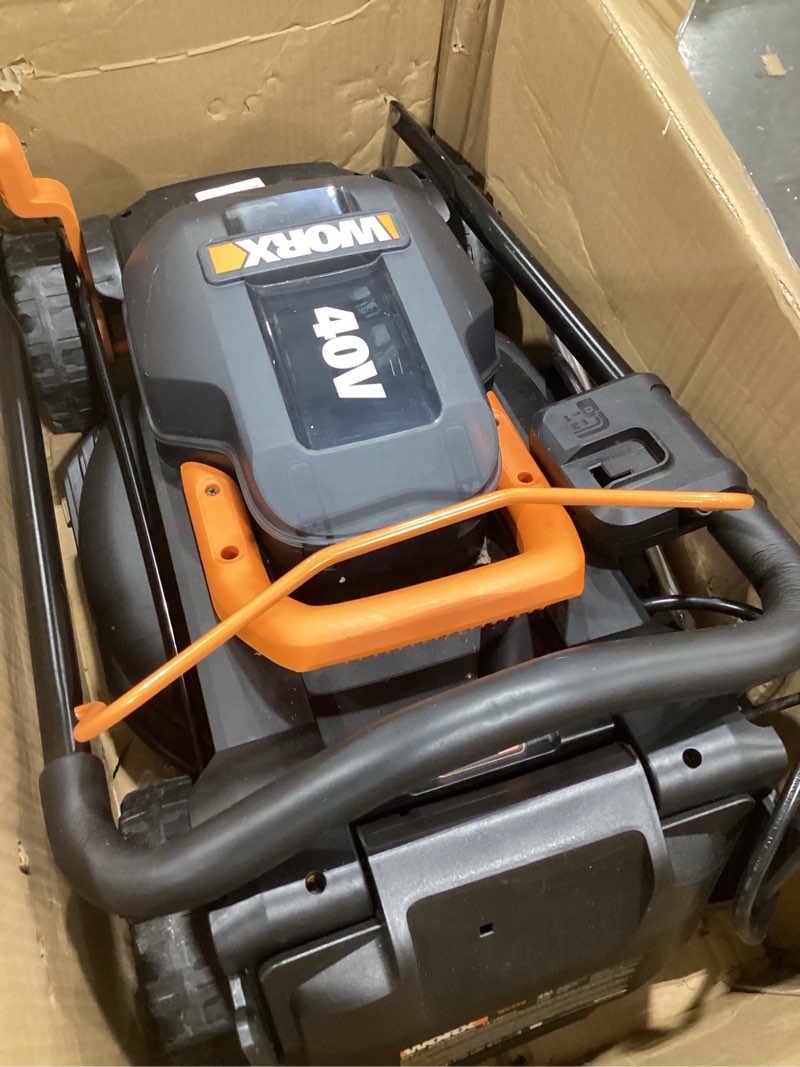 Condition photo showing As Is for WORX 14" Cordless Lawn Mower, 2 in 1 Electric Mower Cuts Quietly, Compact & Lightweight Push Lawn Mower with 6-Position Height Adjustment for Small Yards, 2 Batteries & Charger Included, WG779 14" 40V Mower w/(2) 4.0Ah Batteries