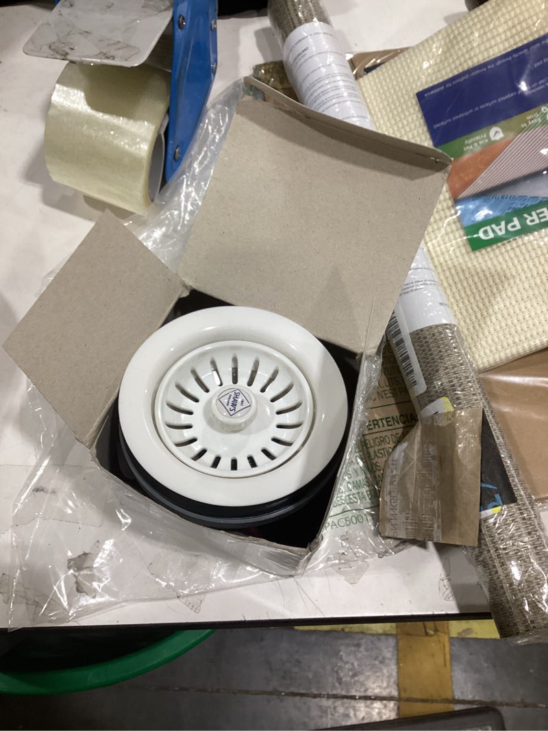 Condition photo showing Good Condition for white polymer drain kitchen sink drain assembly with removable basket strainer and rubber stopper for 3.5-inch drain openings, matching color of granite sinks