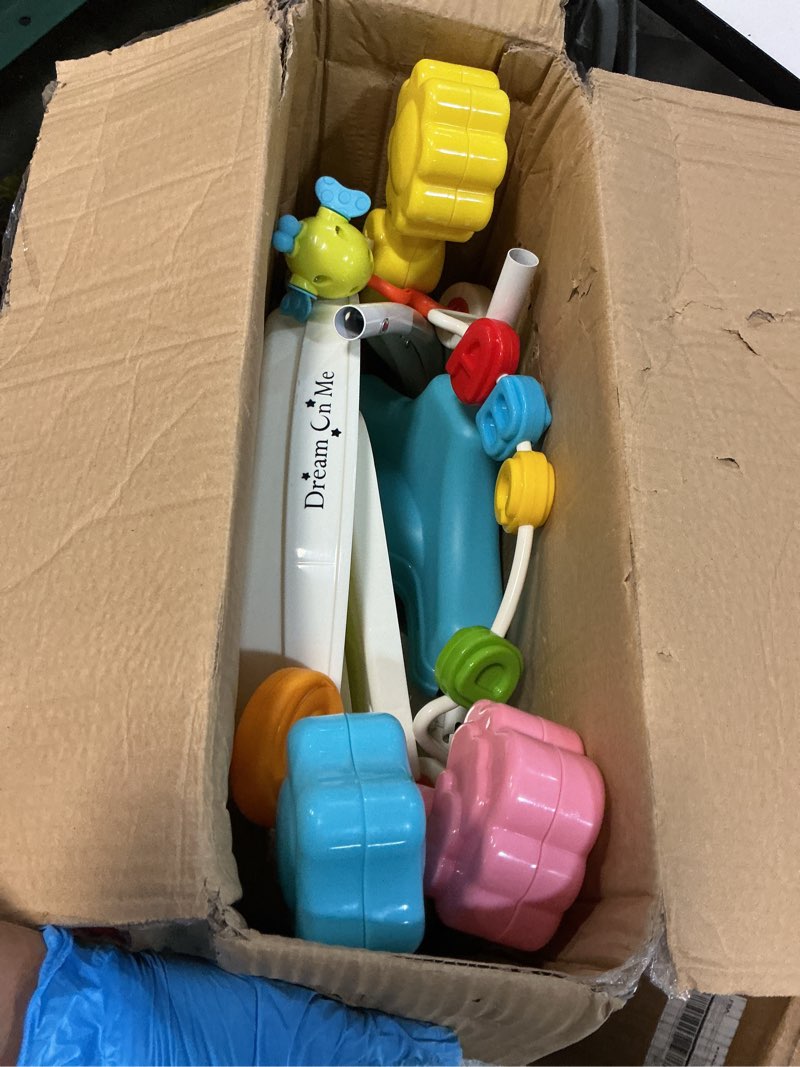Condition photo showing As Is for dream on me zany 2-in-1 activity center and bouncer in star print