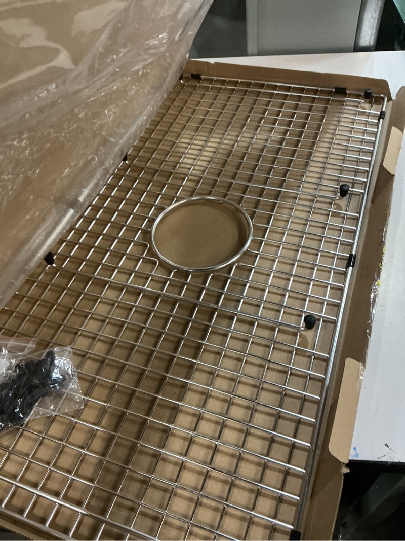 Condition photo showing Good Condition for serene valley sink bottom grid 29-1/2" x 15-9/16", centered drain with corner radius 3/8", sink protector ndg3016c