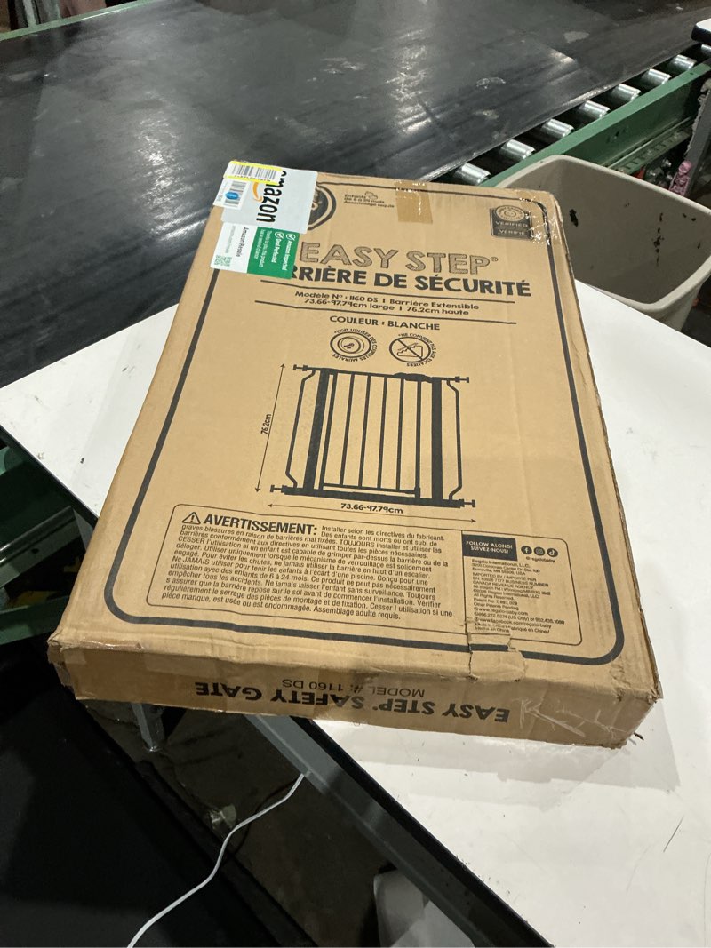 Condition photo showing New/Like New for regalo safety 29-38.5" baby gate for doorways & bottom of stairs, pressure mounted baby gate with door for babies, toddlers & pets, tested & safe for 30 years, american designed, american owned, white white 29-38.5"w x 30"h
