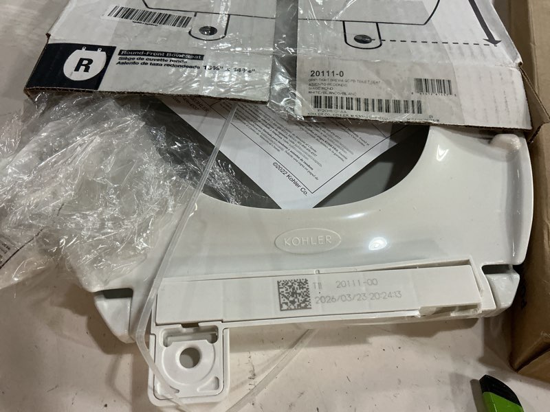 Condition photo showing As Is for kohler 20111-0 brevia, slow close toilet seat, round toilet seat, grip-tight bumpers quick-attach hardware, white