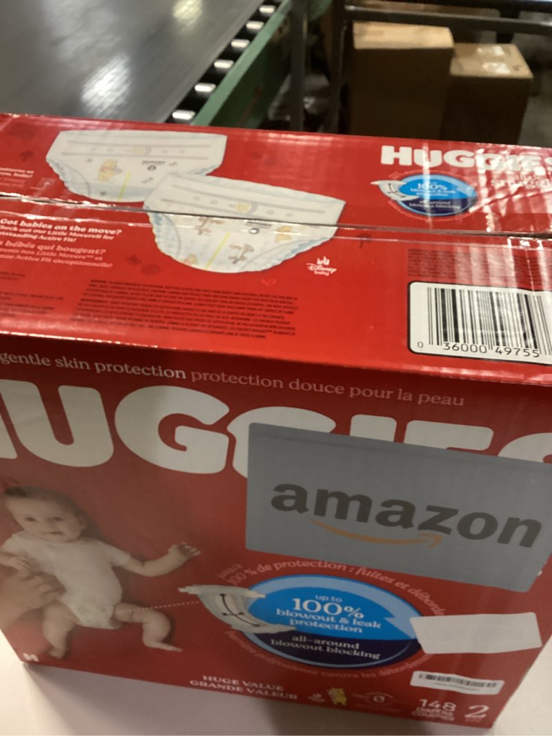 Condition photo showing New/Like New for Huggies Size 2 Diapers, Little Snugglers Baby Diapers, Size 2 (12-18 lbs), 148 Count, Packaging May Vary Size 2 148