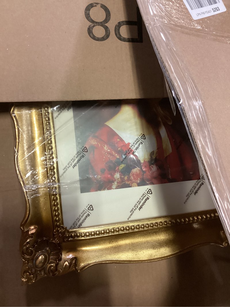 Condition photo showing item condition for SIMON'S SHOP 11x14 Picture Frame with Mat, Vintage Gold Picture Frames 11x14 Matted to 8x10 Image, Ornate Frame for Posters Photos, Wall and Tabletop Display Landscape or Portrait 11x14 Gold