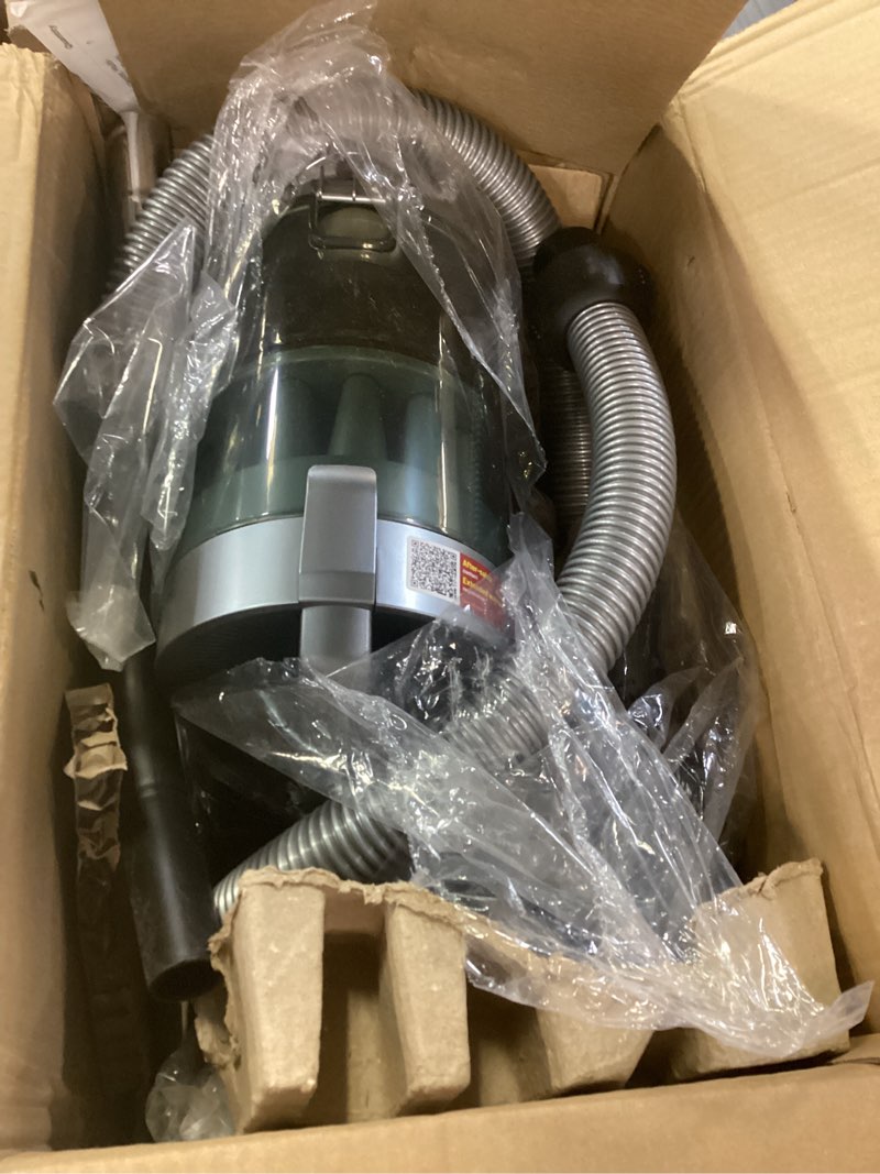 Condition photo showing As Is for 1700w canister vacuum cleaner, 45kpa bagless vacuum cleaner, multi-cyclonic filtration, 2 anti-allergen hepa filters, 3.5qt dust cup, 4 tools, corded vacuum for hard floor, pet hair, turquoise