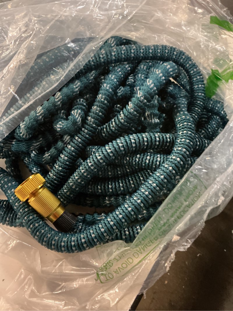 Condition photo showing As Is for garden hose, non-expandable water hose 100ft, flexible, kink & leak proof water pipe with 10-function spray nozzle, lightweight outdoor hose for yard, lawn, car wash, rv and home use