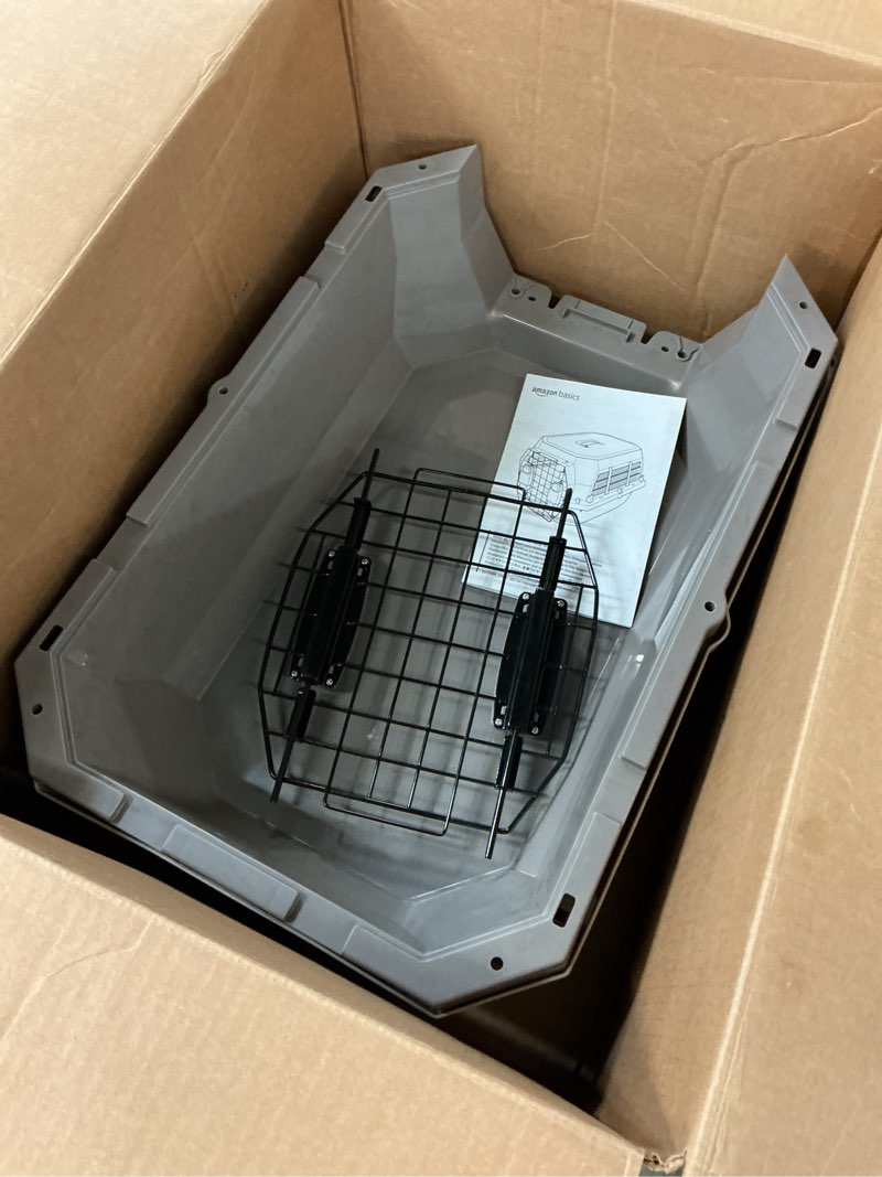 Condition photo showing As Is for Amazon Basics Hard-Sided Dog and Cat Kennel Single-Door Travel Pet Carrier with Metal Wire Ventilation, 23.6" L x 15.7" W x 13.0" H, Beige Beige 23.6"L x 15.7"W x 13.0"H