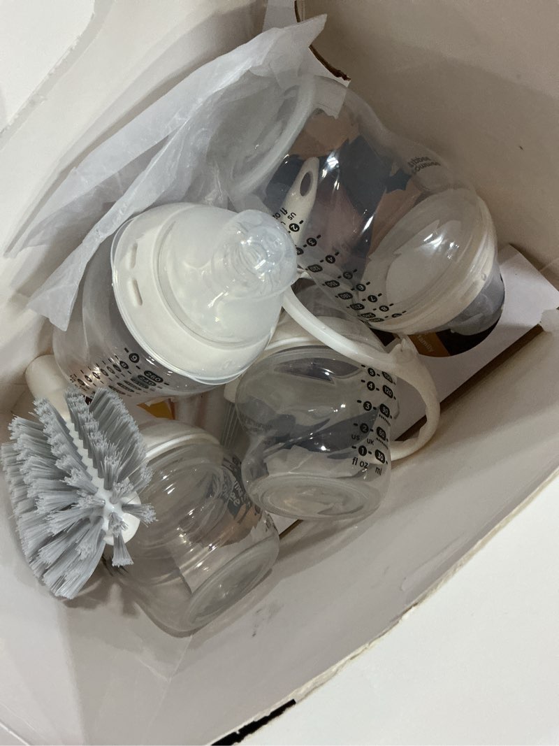 Condition photo showing New/Like New for tommee tippee natural start grow with baby bpa free bottle 13 piece set, 2 x 5oz, 3 x 9oz and 1 x 11oz, slow, medium and thicker flow nipples, removable bottle handles 13 pieces clear