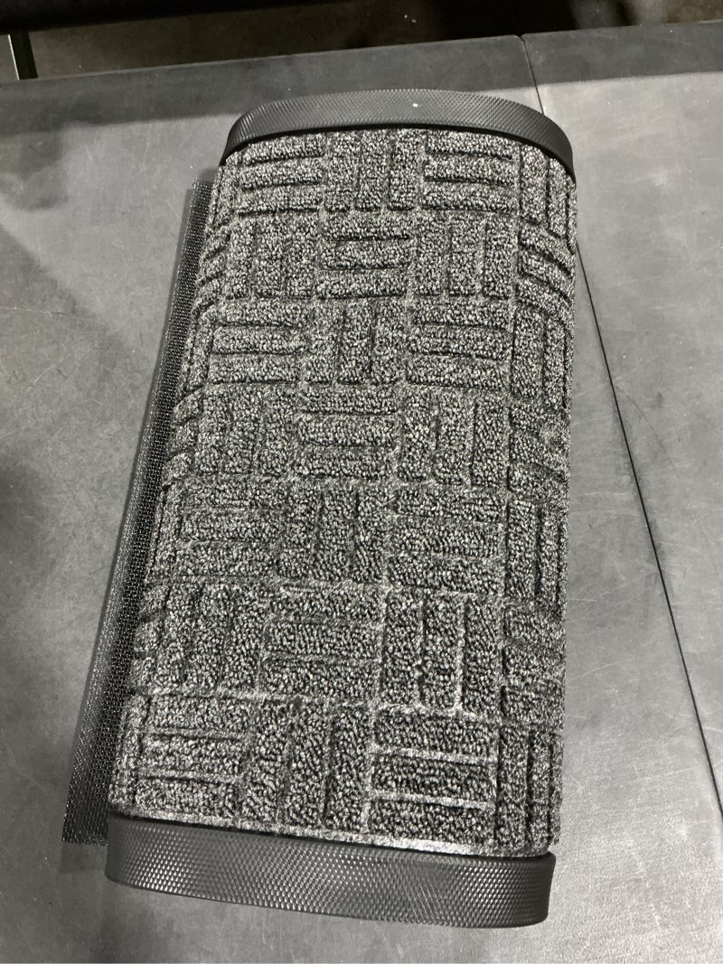 Condition photo showing New/Like New for OLANLY Front Door Mat Outside Entrance 47x17, Absorbent, Heavy Duty Sturdy Natural Rubber Doormat Indoor Outdoor, Non-Slip, Stain and Fade Resistant, Low Profile Floor Mat for Entryway, Black Gray Black Gray Maze Rectangular 47" x 17"