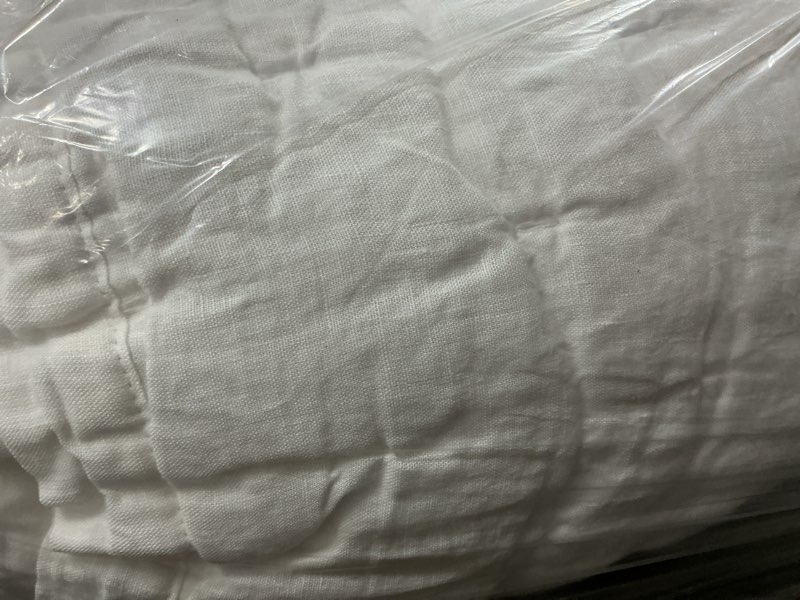 Condition photo showing As Is for european linen dream quilt, king/calking, white