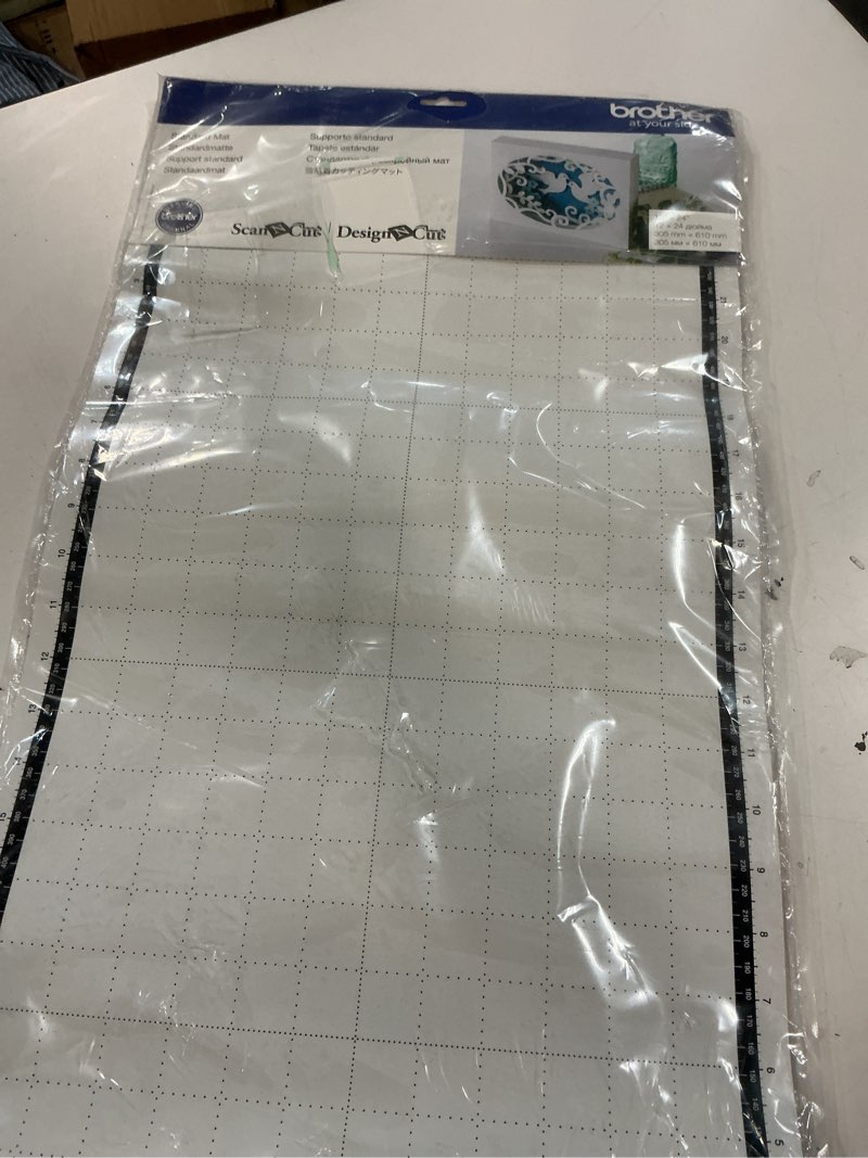 Condition photo showing Good Condition for Brother Standard Mat 12”x24”, CAMATSTD24, 12"X24" for use with: CM100DM, CM250, CM350, CM350H, CM350R, CM550DX, CM650W, CM650WX, DC200, DC200ULE.