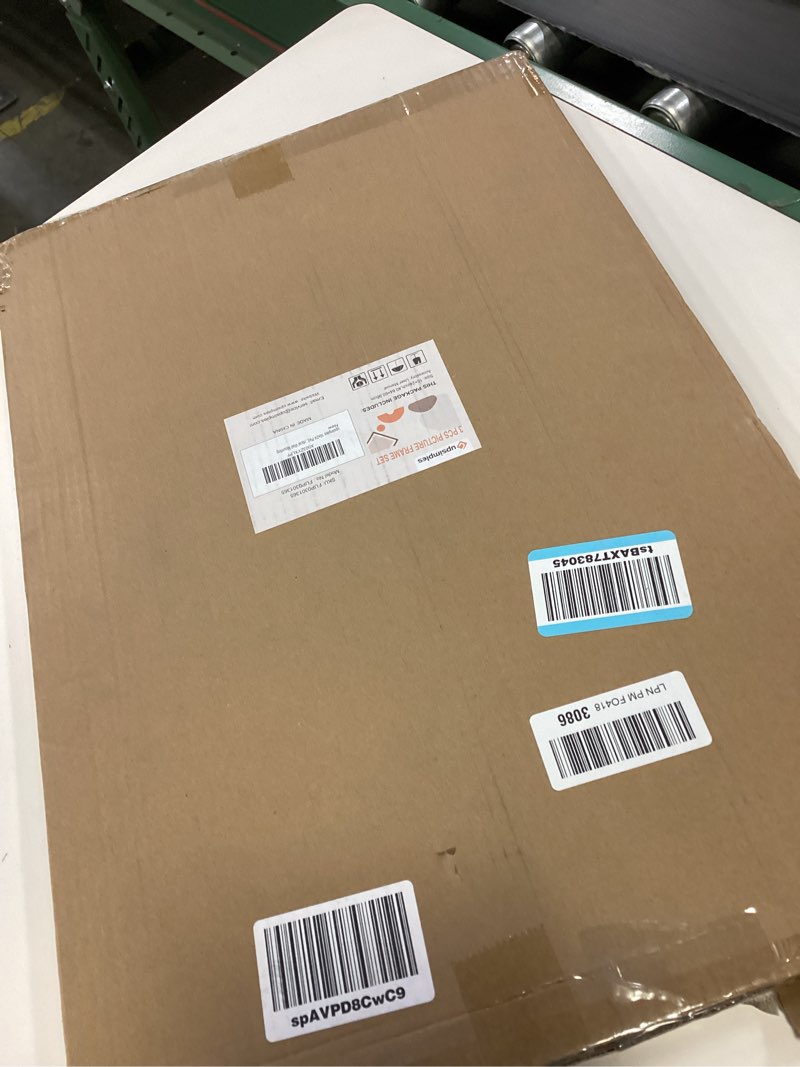 Condition photo showing New/Like New for upsimples 16x24 Picture Frame White 3 Pack, Scratch-Proof Poster Frames 16 x 24 for Photo Gallery - Slide-In Strips, Horizontal or Vertical Wall Mounting White 16x24